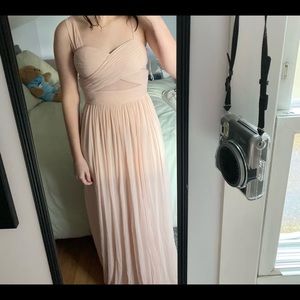 Small size 2-4. Never worn